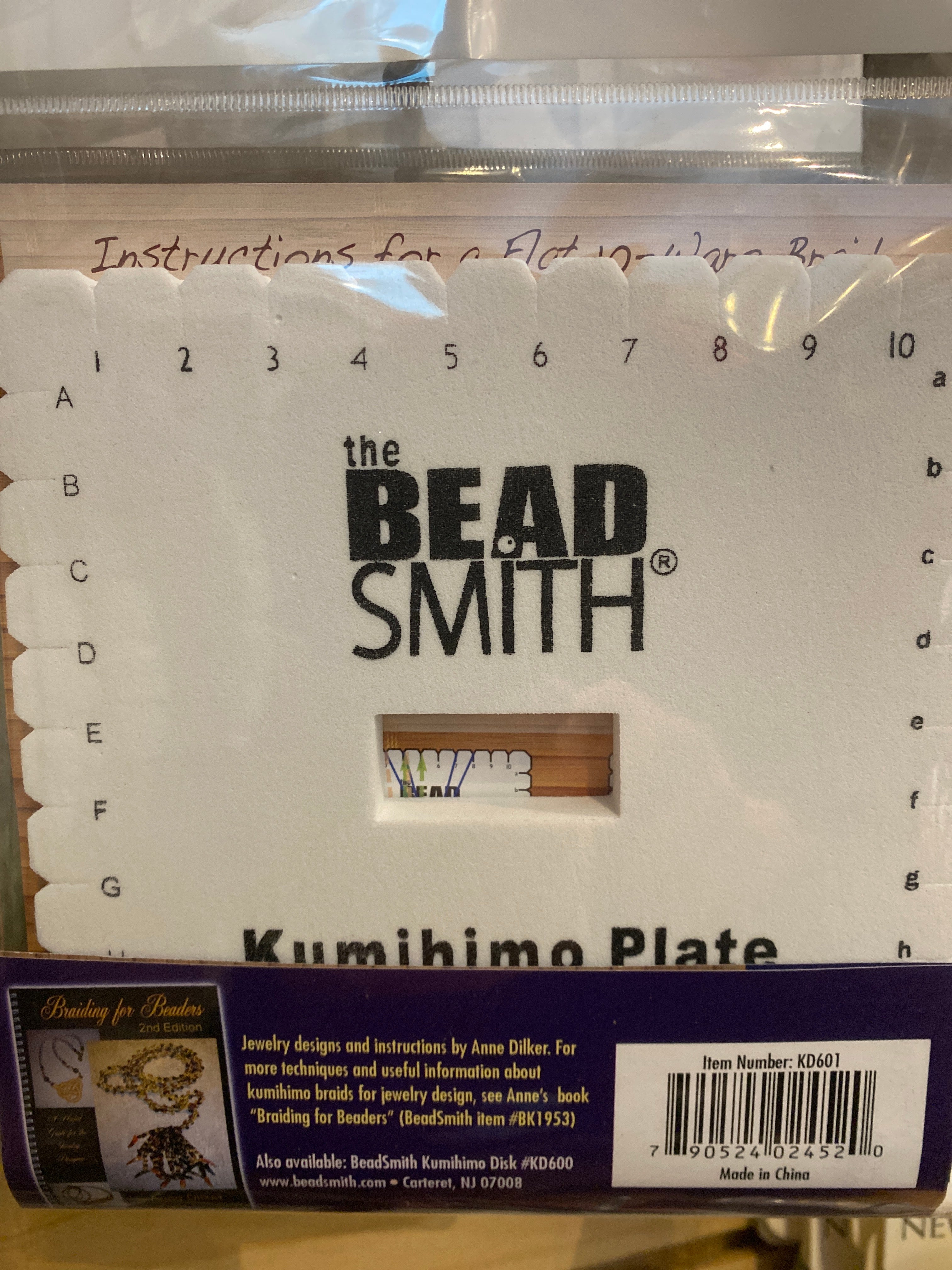 Kumihimo braiding plate by The Beadsmith