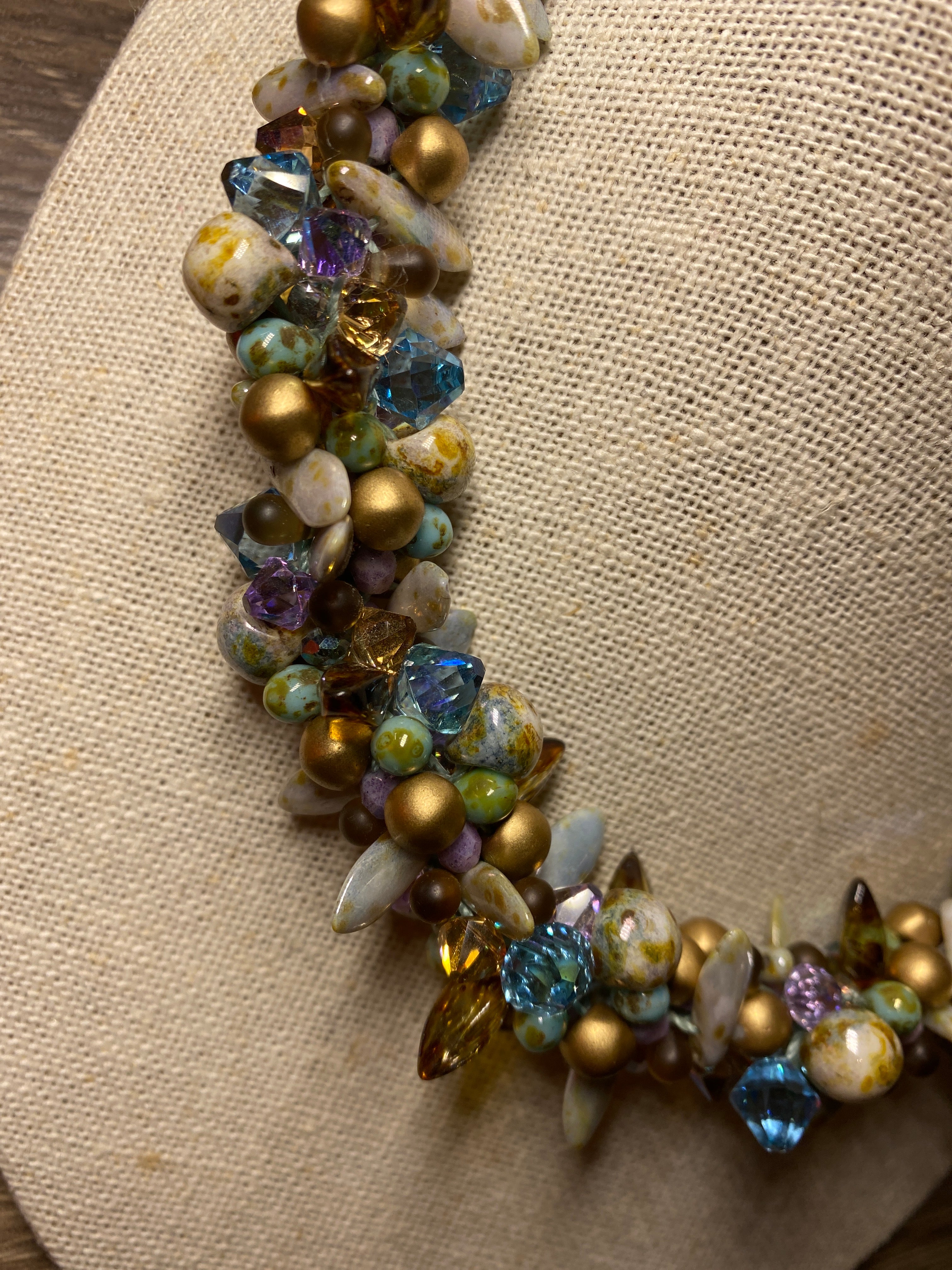 Necklace, finished jewelry, kumihimo, aqua champagne/violet/golden shadow top drilled crystals