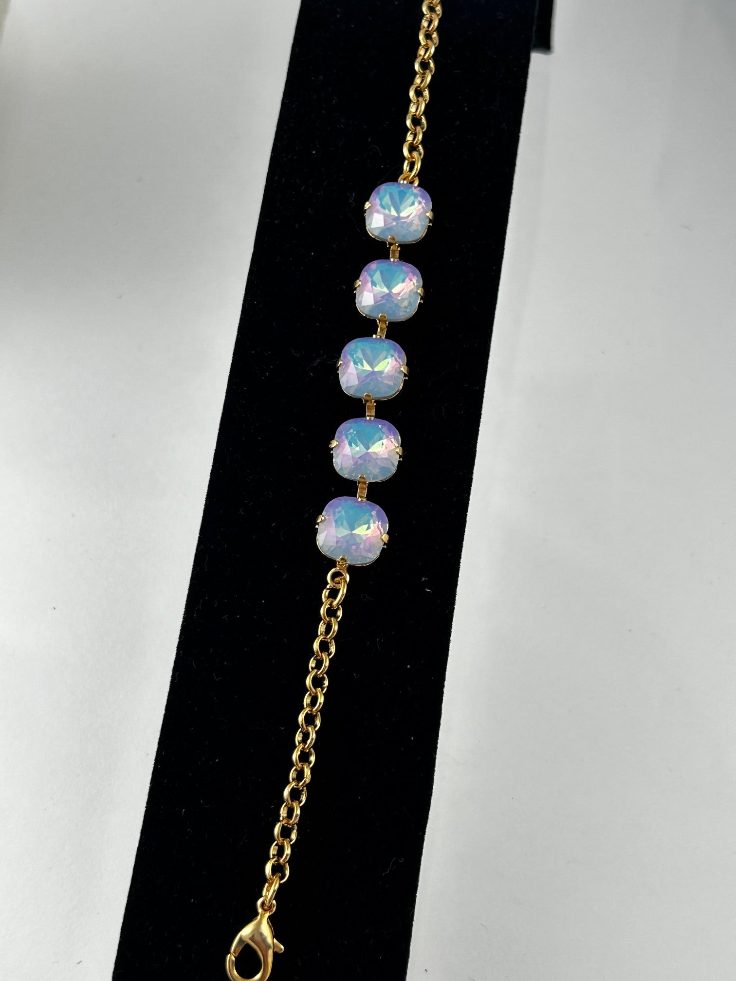 Bracelet, finished jewelry, 10mm square white opal star shine with gold extender bracelet