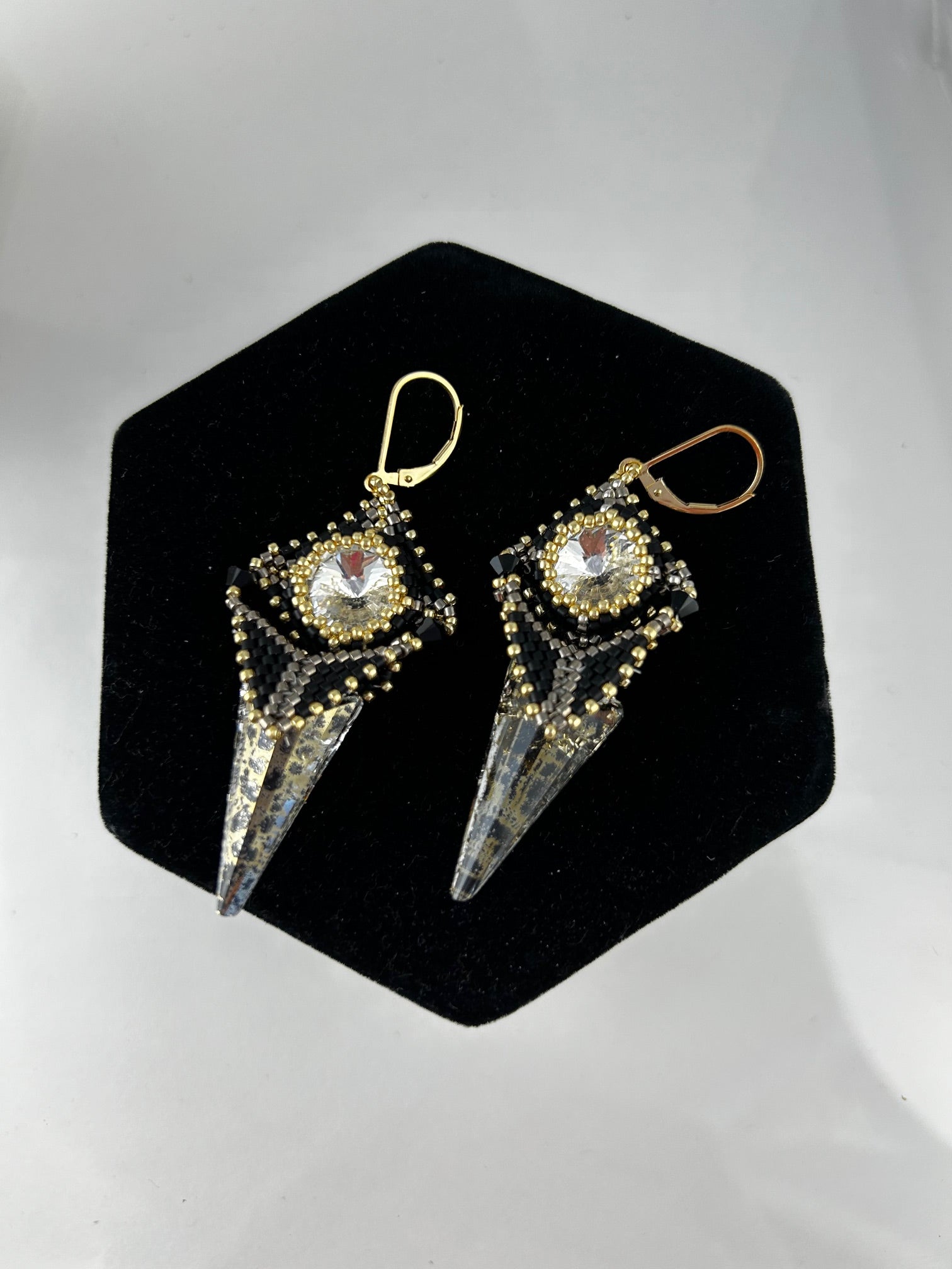 Earrings, finished jewelry, Two inch black and gold spike earrings