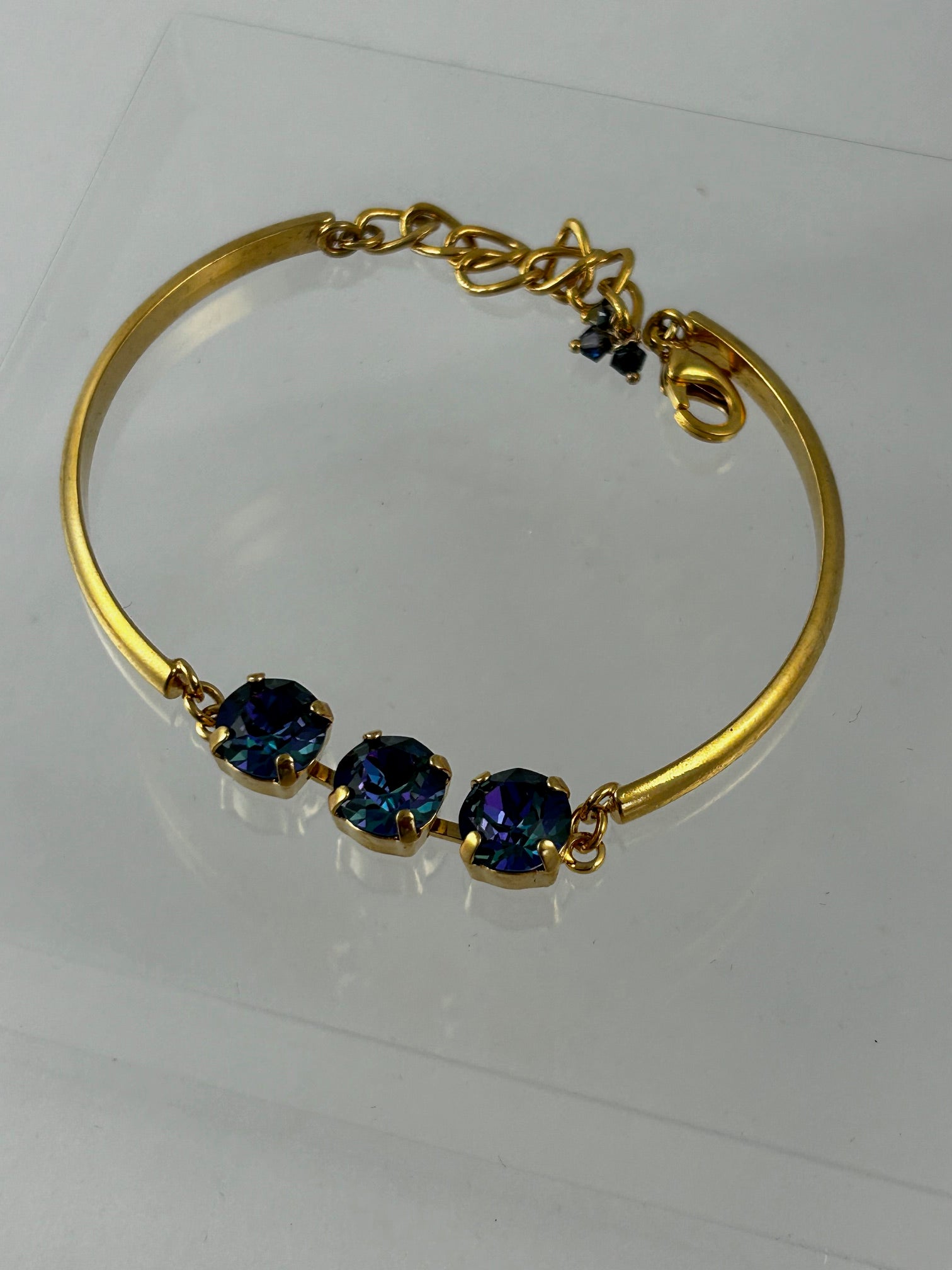 Bracelet, finished jewelry, Adjustable gold rhodium and tanzanite glacier blue size 8 crystals
