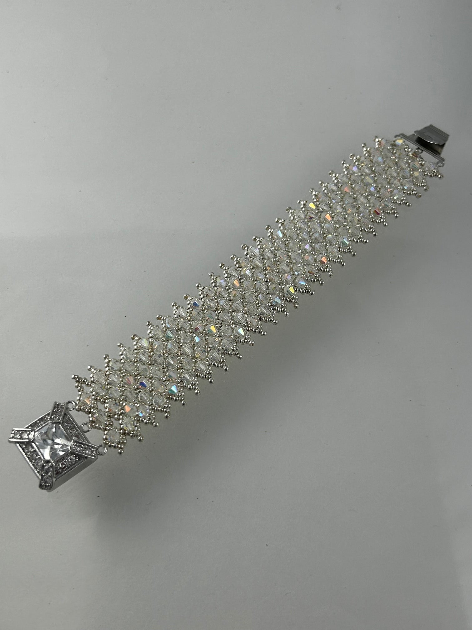 Bracelet, finished jewelry, 4mm crystal ab and sterling netted bracelet with fancy clasp