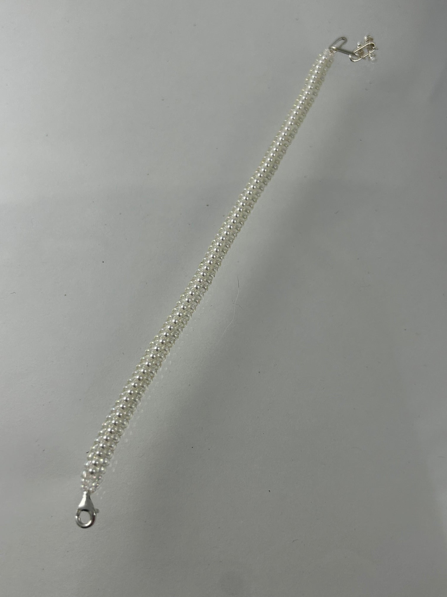 Bracelet, finished jewelry, 2mm herringbone pearl bracelet with sterling adjustable clasp
