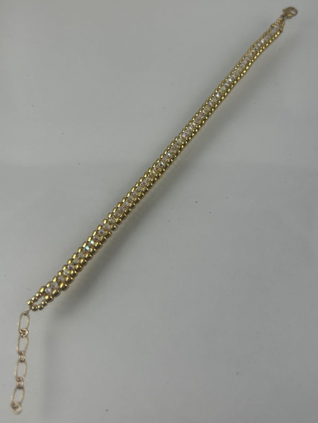 Permanent finished gold seed beads with clear crystal herringbone bracelet $48