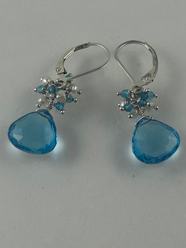 Swiss blue topaz and pearl earrings with sterling lever backs.